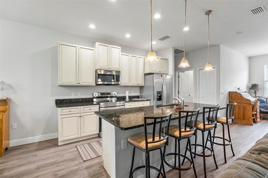 The beach is certainly within reach on this 3 bedroom, 2 bath, 2 on The Grand Club Cypress Course in Florida - for sale on GolfHomes.com, golf home, golf lot