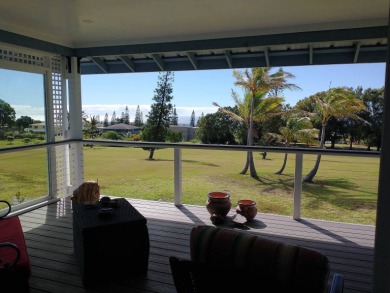This 2022 beauty near the 18th tee with ocean and fairway views on Discovery Harbour Golf Course in Hawaii - for sale on GolfHomes.com, golf home, golf lot