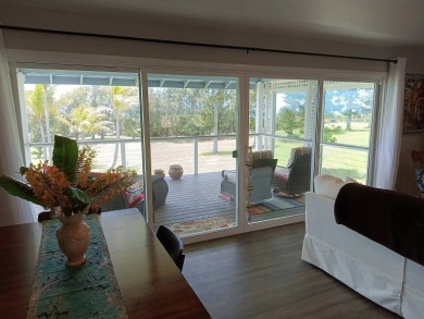 This 2022 beauty near the 18th tee with ocean and fairway views on Discovery Harbour Golf Course in Hawaii - for sale on GolfHomes.com, golf home, golf lot