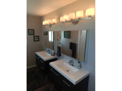 This 2022 beauty near the 18th tee with ocean and fairway views on Discovery Harbour Golf Course in Hawaii - for sale on GolfHomes.com, golf home, golf lot