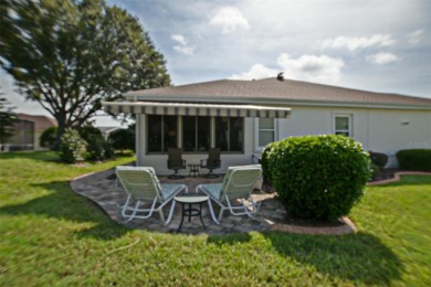 Move in ready and highly popular Santa Rosa floor plan, boasts 2 on Eagle Ridge At Spruce Creek Country Club in Florida - for sale on GolfHomes.com, golf home, golf lot