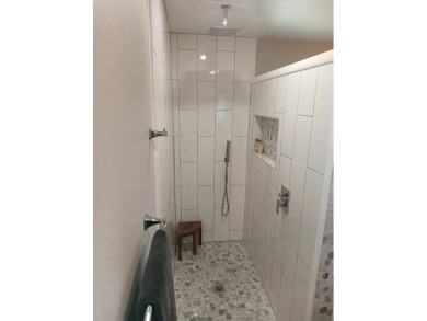 This 2022 beauty near the 18th tee with ocean and fairway views on Discovery Harbour Golf Course in Hawaii - for sale on GolfHomes.com, golf home, golf lot