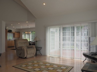This exceptional home overlooks the 14th hole and beautiful lake on The Clubs of Olde Mill in Virginia - for sale on GolfHomes.com, golf home, golf lot