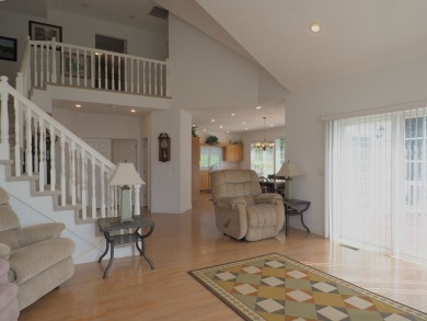 This exceptional home overlooks the 14th hole and beautiful lake on The Clubs of Olde Mill in Virginia - for sale on GolfHomes.com, golf home, golf lot