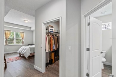 The beach is certainly within reach on this 3 bedroom, 2 bath, 2 on The Grand Club Cypress Course in Florida - for sale on GolfHomes.com, golf home, golf lot