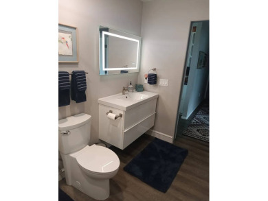 This 2022 beauty near the 18th tee with ocean and fairway views on Discovery Harbour Golf Course in Hawaii - for sale on GolfHomes.com, golf home, golf lot