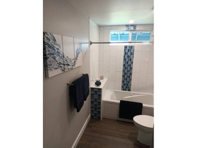 This 2022 beauty near the 18th tee with ocean and fairway views on Discovery Harbour Golf Course in Hawaii - for sale on GolfHomes.com, golf home, golf lot