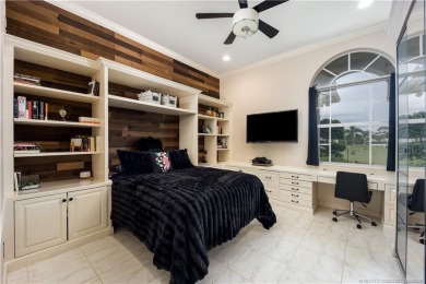 Nestled on a serene one-acre lot along the 6th fairway of on Evergreen Club in Florida - for sale on GolfHomes.com, golf home, golf lot