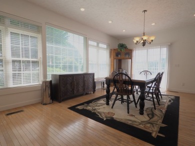 This exceptional home overlooks the 14th hole and beautiful lake on The Clubs of Olde Mill in Virginia - for sale on GolfHomes.com, golf home, golf lot