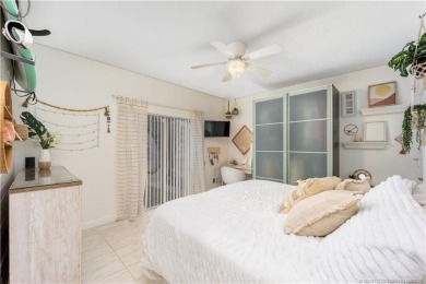 Nestled on a serene one-acre lot along the 6th fairway of on Evergreen Club in Florida - for sale on GolfHomes.com, golf home, golf lot