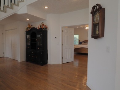 This exceptional home overlooks the 14th hole and beautiful lake on The Clubs of Olde Mill in Virginia - for sale on GolfHomes.com, golf home, golf lot