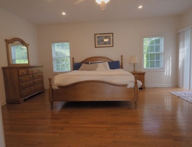 This exceptional home overlooks the 14th hole and beautiful lake on The Clubs of Olde Mill in Virginia - for sale on GolfHomes.com, golf home, golf lot