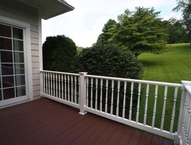This exceptional home overlooks the 14th hole and beautiful lake on The Clubs of Olde Mill in Virginia - for sale on GolfHomes.com, golf home, golf lot