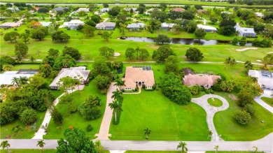 Nestled on a serene one-acre lot along the 6th fairway of on Evergreen Club in Florida - for sale on GolfHomes.com, golf home, golf lot