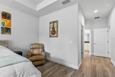 The beach is certainly within reach on this 3 bedroom, 2 bath, 2 on The Grand Club Cypress Course in Florida - for sale on GolfHomes.com, golf home, golf lot