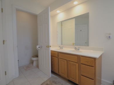 This exceptional home overlooks the 14th hole and beautiful lake on The Clubs of Olde Mill in Virginia - for sale on GolfHomes.com, golf home, golf lot