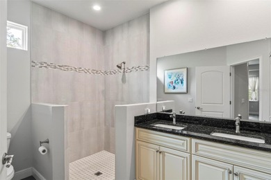 The beach is certainly within reach on this 3 bedroom, 2 bath, 2 on The Grand Club Cypress Course in Florida - for sale on GolfHomes.com, golf home, golf lot