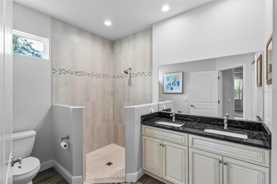 The beach is certainly within reach on this 3 bedroom, 2 bath, 2 on The Grand Club Cypress Course in Florida - for sale on GolfHomes.com, golf home, golf lot