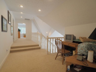 This exceptional home overlooks the 14th hole and beautiful lake on The Clubs of Olde Mill in Virginia - for sale on GolfHomes.com, golf home, golf lot