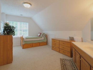 This exceptional home overlooks the 14th hole and beautiful lake on The Clubs of Olde Mill in Virginia - for sale on GolfHomes.com, golf home, golf lot