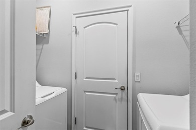 The beach is certainly within reach on this 3 bedroom, 2 bath, 2 on The Grand Club Cypress Course in Florida - for sale on GolfHomes.com, golf home, golf lot