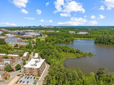 Step into the enchanting embrace of Lake Shore Lakeside VIEW on Lonnie Poole Golf Course in North Carolina - for sale on GolfHomes.com, golf home, golf lot