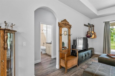 The beach is certainly within reach on this 3 bedroom, 2 bath, 2 on The Grand Club Cypress Course in Florida - for sale on GolfHomes.com, golf home, golf lot