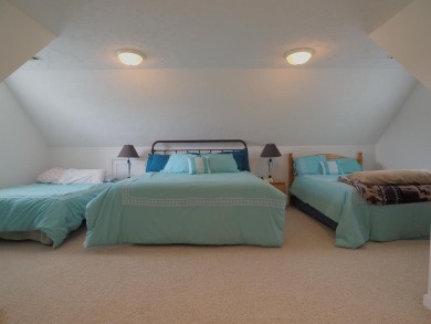 This exceptional home overlooks the 14th hole and beautiful lake on The Clubs of Olde Mill in Virginia - for sale on GolfHomes.com, golf home, golf lot