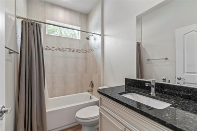 The beach is certainly within reach on this 3 bedroom, 2 bath, 2 on The Grand Club Cypress Course in Florida - for sale on GolfHomes.com, golf home, golf lot