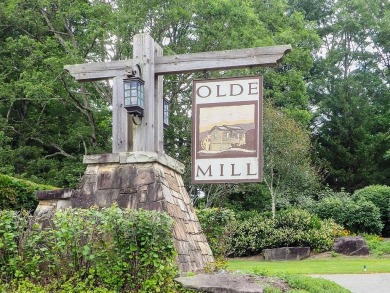 This exceptional home overlooks the 14th hole and beautiful lake on The Clubs of Olde Mill in Virginia - for sale on GolfHomes.com, golf home, golf lot