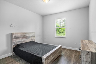 The beach is certainly within reach on this 3 bedroom, 2 bath, 2 on The Grand Club Cypress Course in Florida - for sale on GolfHomes.com, golf home, golf lot