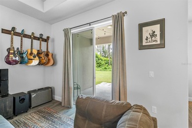 The beach is certainly within reach on this 3 bedroom, 2 bath, 2 on The Grand Club Cypress Course in Florida - for sale on GolfHomes.com, golf home, golf lot