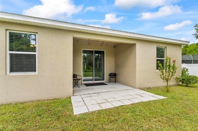 The beach is certainly within reach on this 3 bedroom, 2 bath, 2 on The Grand Club Cypress Course in Florida - for sale on GolfHomes.com, golf home, golf lot