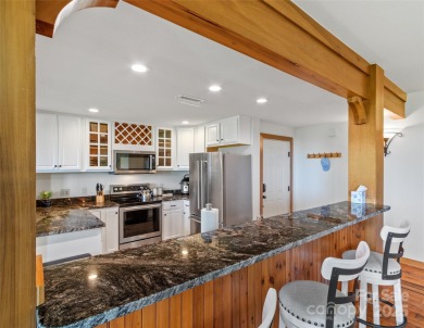 This is a must-see, upscale well-appointed condo in the gorgeous on Mountain Air Country Club in North Carolina - for sale on GolfHomes.com, golf home, golf lot