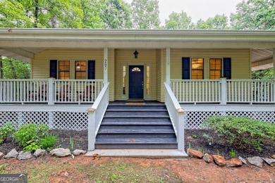Nestled in Burton Getaways Community, this charming Fee Simple on Waterfall Country Club in Georgia - for sale on GolfHomes.com, golf home, golf lot