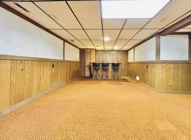 Move right in to this beautiful brick and spacious 4-bedroom on Lakes of the Four Seasons Country Club in Indiana - for sale on GolfHomes.com, golf home, golf lot