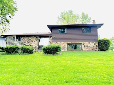 Move right in to this beautiful brick and spacious 4-bedroom on Lakes of the Four Seasons Country Club in Indiana - for sale on GolfHomes.com, golf home, golf lot