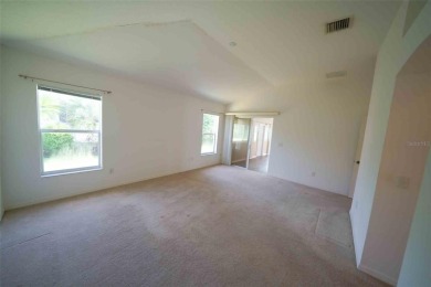 *big footprint + priced for updates.* Save on this Home For Sale on The Links of Spruce Creek in Florida - for sale on GolfHomes.com, golf home, golf lot