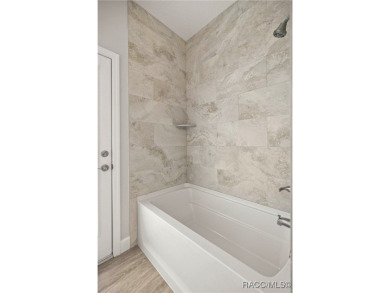 Brand new and move-in ready, this 4-bedroom, 3-bathroom pool on Pine Ridge Community Golf and Country Club in Florida - for sale on GolfHomes.com, golf home, golf lot