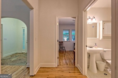 Nestled in Burton Getaways Community, this charming Fee Simple on Waterfall Country Club in Georgia - for sale on GolfHomes.com, golf home, golf lot