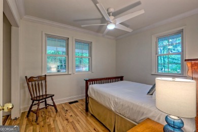 Nestled in Burton Getaways Community, this charming Fee Simple on Waterfall Country Club in Georgia - for sale on GolfHomes.com, golf home, golf lot