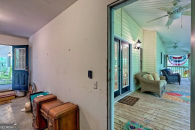 Nestled in Burton Getaways Community, this charming Fee Simple on Waterfall Country Club in Georgia - for sale on GolfHomes.com, golf home, golf lot