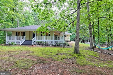 Nestled in Burton Getaways Community, this charming Fee Simple on Waterfall Country Club in Georgia - for sale on GolfHomes.com, golf home, golf lot