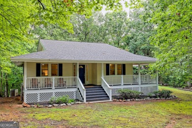 Nestled in Burton Getaways Community, this charming Fee Simple on Waterfall Country Club in Georgia - for sale on GolfHomes.com, golf home, golf lot