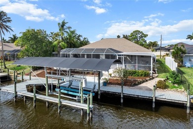 Direct Gulf Access pool home with updated kitchen and an on El Rio Golf Course and Club in Florida - for sale on GolfHomes.com, golf home, golf lot