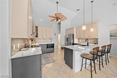 Direct Gulf Access pool home with updated kitchen and an on El Rio Golf Course and Club in Florida - for sale on GolfHomes.com, golf home, golf lot