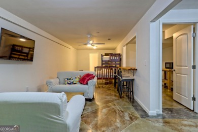 Nestled in Burton Getaways Community, this charming Fee Simple on Waterfall Country Club in Georgia - for sale on GolfHomes.com, golf home, golf lot