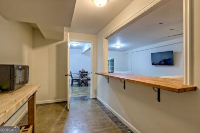 Nestled in Burton Getaways Community, this charming Fee Simple on Waterfall Country Club in Georgia - for sale on GolfHomes.com, golf home, golf lot