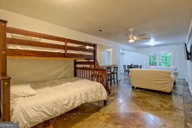 Nestled in Burton Getaways Community, this charming Fee Simple on Waterfall Country Club in Georgia - for sale on GolfHomes.com, golf home, golf lot