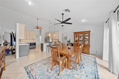 Direct Gulf Access pool home with updated kitchen and an on El Rio Golf Course and Club in Florida - for sale on GolfHomes.com, golf home, golf lot